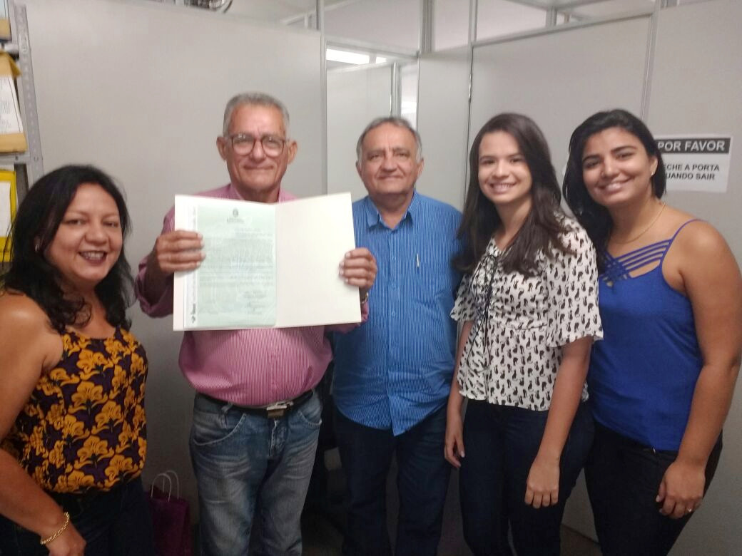 Seu João Araújo, diretor e equipe de titulação