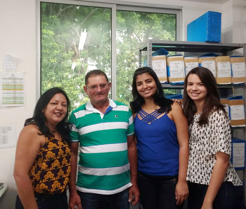 Seu João Maia e equipe do setor de titulação